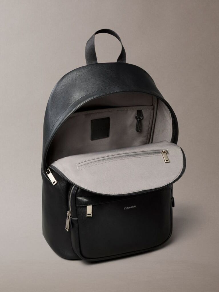 Black Micro Pebble Round Backpack  Men